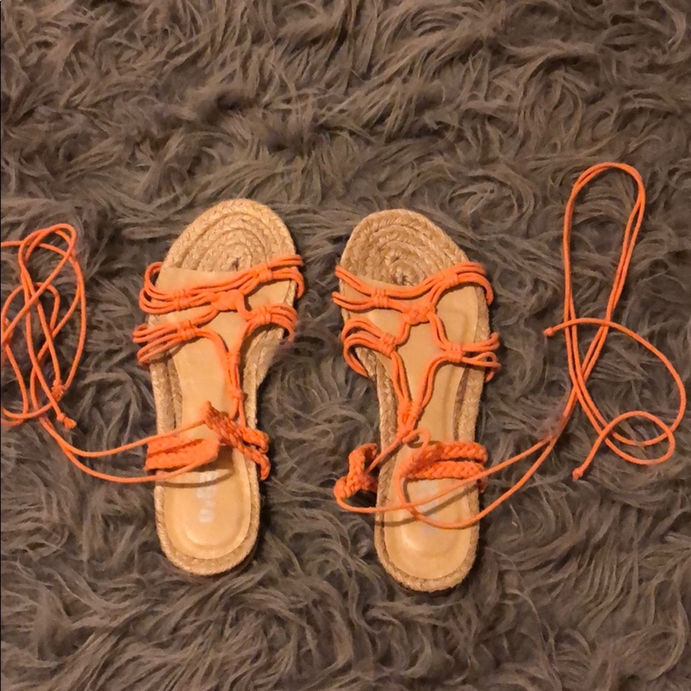 Orange gladiator sandals (from Spain)